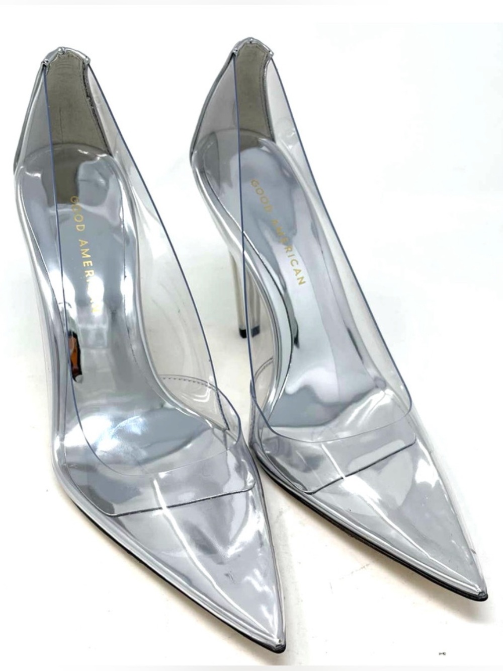 Good American Clear Pointed-Toe “Cinderella” Stiletto Heels with Silver Insole.